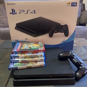 PS4 1TB – Lightly Used – Includes Controller & All Cables And Four Games
